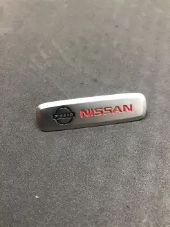 шилдик логотип nissan